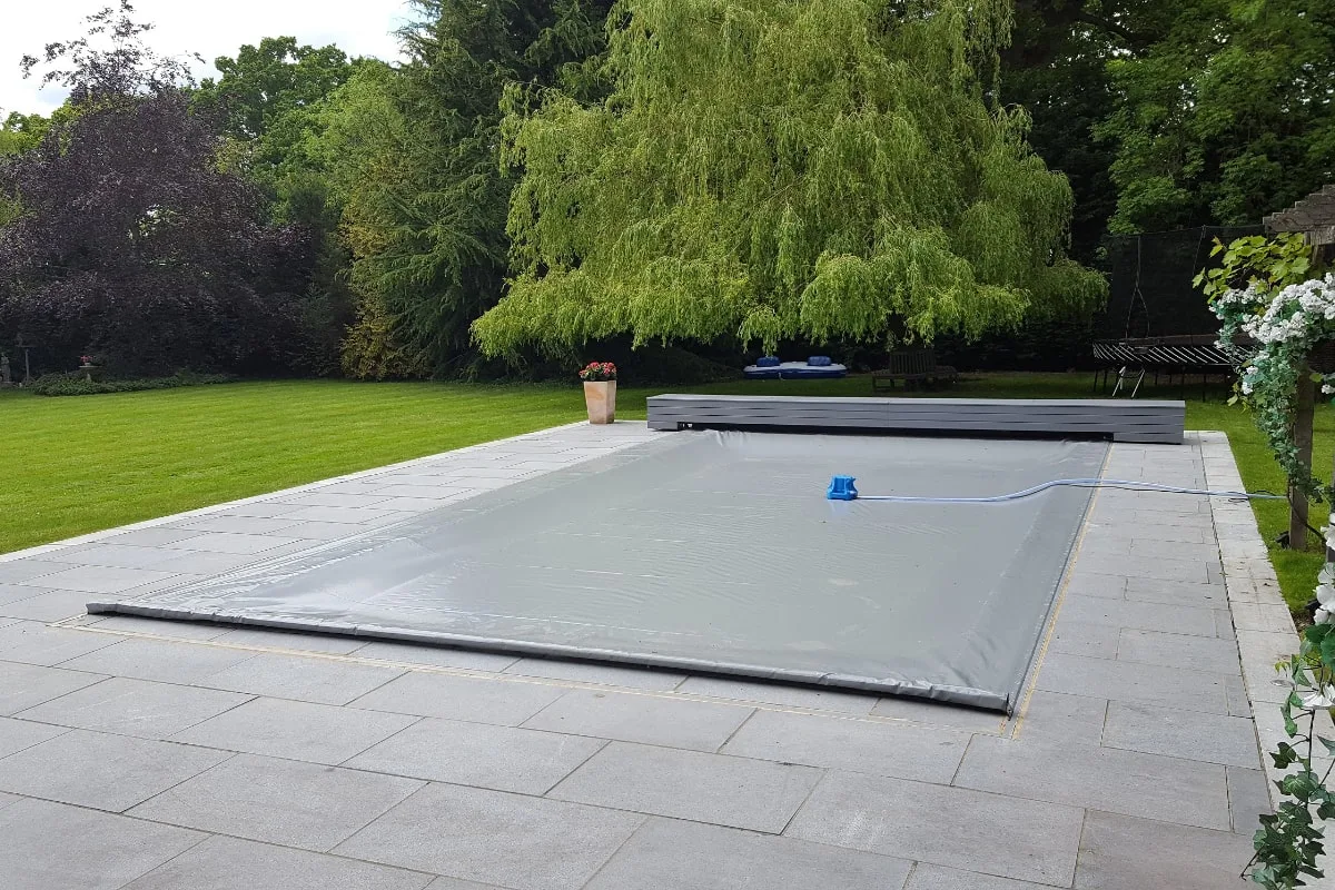Aqua Lagoon grey automatic swimming pool cover with grey track and housing